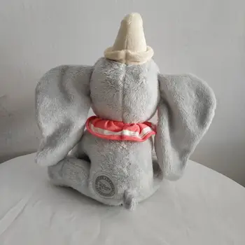 Безплатна доставка седи 25 см оригинални слона Дъмбо на плюшени играчки, плюшени играчки, добър мек момче кукла за подарък на детето