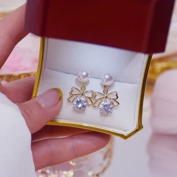 14 K днешно позлатени мода бижута на Crystal Pearl кухи лък изискани обеци за жени празник на партията елегантни обеци