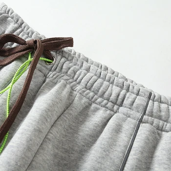 Wixra Womens Workout Drawstring 95% памук, зреещи ежедневни разтеглив талията ПУ спортни панталони отразяващи новите модни панталони